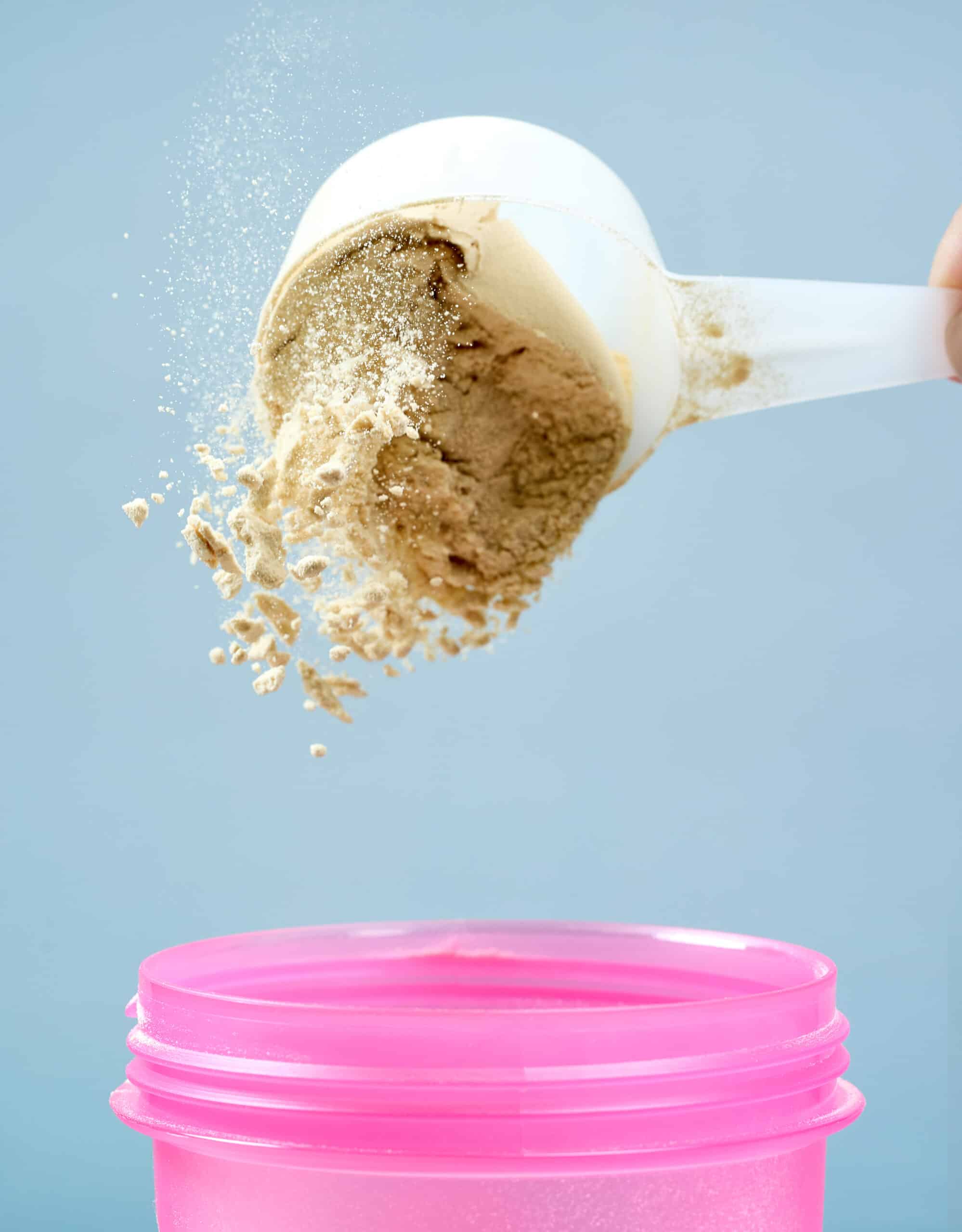 protein powder spills in cup from measure scoop 2025 10 08 09 28 37 utc